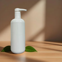 Load image into Gallery viewer, 16oz white bottle with lotion pump with a brown background 

